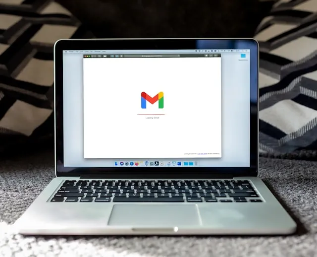 A mac laptop running a web browser and gmail